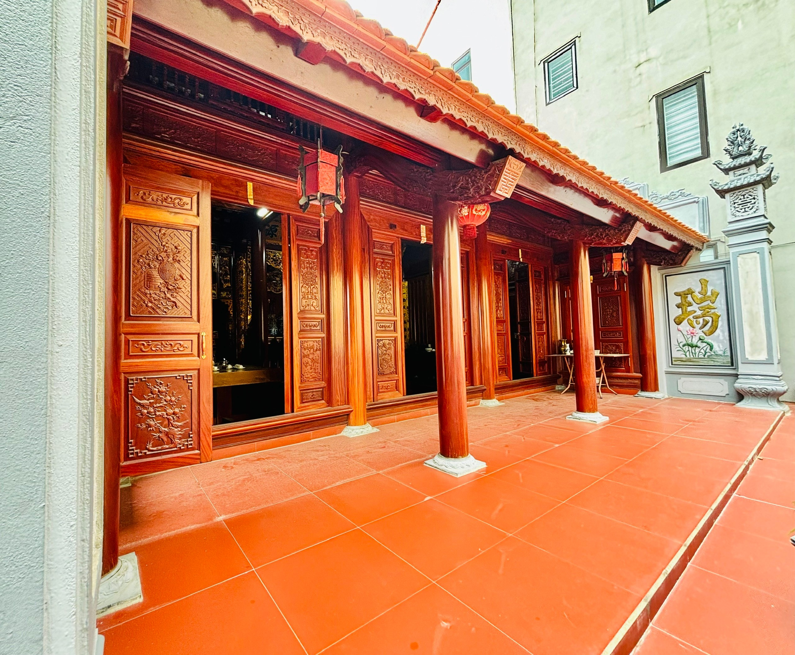 A building with red tile floor AI-generated content may be incorrect.